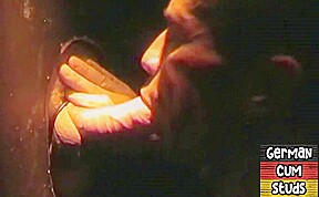 German gay sucks dick in gloryhole while jerking it
