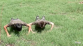 Gay twinks in military uniform fuck on the instruction field