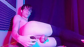 Caged Femboy Rides Dildo